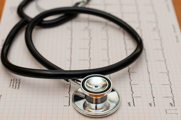Stethoscope on a cardiogram result