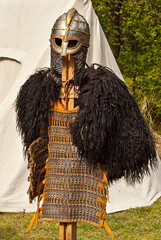 Demonstration of knightly armor. Reconstruction of weapons and clothing of the Middle Ages. Clothes...