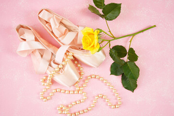 Pointe Ballet Shoes Aesthetic theme desktop workspace background on stylish pink textured background. Top view blog hero header creative composition flat lay.