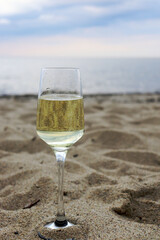 glass of wine on the beach