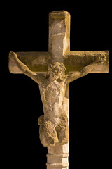 The crucifixion of Jesus Christ. Very ancient stone statue.