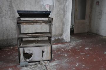 Old broken radio in apartment of ghost town Pripyat, Chernobyl zone, abandoned thing