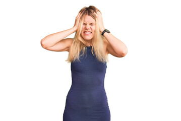 Fototapeta na wymiar Young beautiful blonde woman wearing casual dress suffering from headache desperate and stressed because pain and migraine. hands on head.
