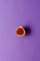 still life organic fig fruits, violet background.