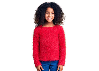 African american child with curly hair wearing casual winter sweater looking positive and happy standing and smiling with a confident smile showing teeth