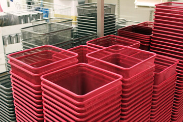 Lots of red rectangular baskets put together
