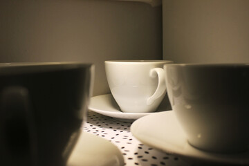 The light fell on the white cup