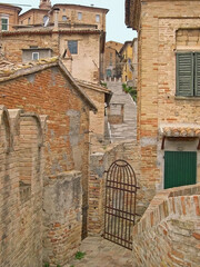 Italy, Marche, Corinaldo downtown medieval buildings. 