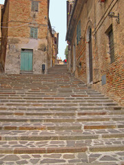 Italy, Marche, Corinaldo downtown medieval steps.