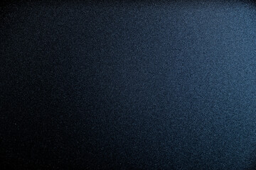 Empty dark blue, near black background with light overtones..