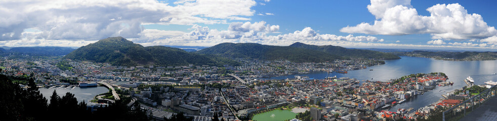 Fototapeta na wymiar Spectacular Panorama View From Mount Floyen To Downtown And The Harbour Of Bergen On A Sunny Summer Day With A Clear Blue Sky And A Few Clouds