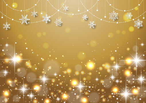 雪の結晶がぶら下がった キラキラ イルミネーションのクリスマス背景 フレーム　金