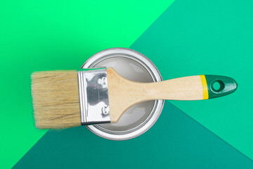 Open paint enamel cans on color palette samples. The concept of repair, construction. Shades of...