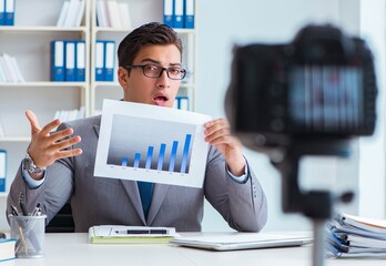 Business blogger doing webcast for his subscribers