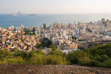 Elevated View of Slums on the Hill and Ipanema District Below With an Ocean in the Horizon in Rio...