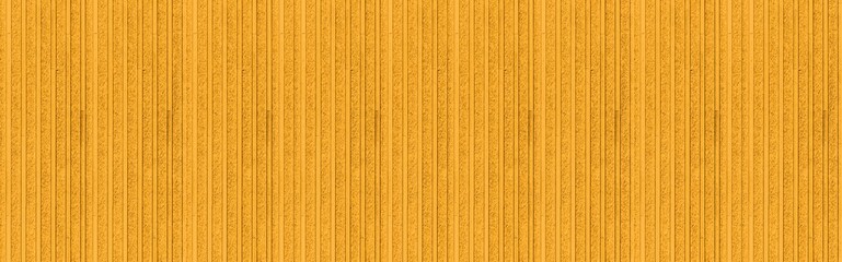 Panorama of Modern brown stone wall with stripes texture and seamless background