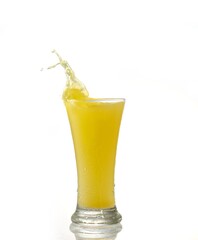 Fototapeta na wymiar splashing orange juice with oranges isolated on white