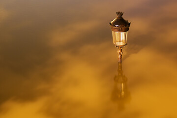 Fototapeta na wymiar Parisian lamp post under underwater
