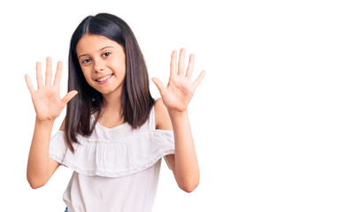 Beautiful child girl wearing casual clothes showing and pointing up with fingers number ten while smiling confident and happy.
