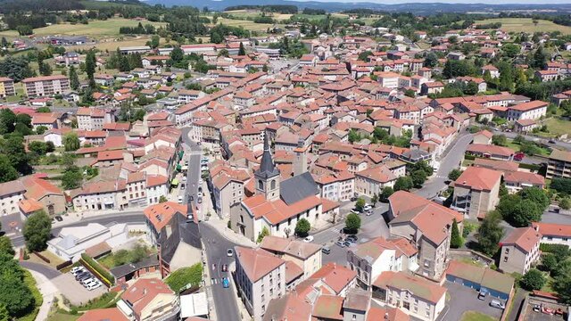 Flight over the city Craponne-sur-Arzon on summer day. France 