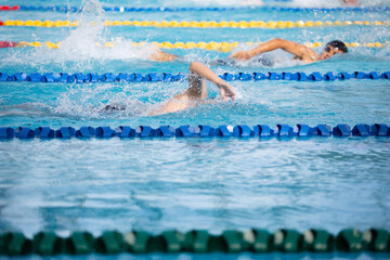 Swimming competition And the boy's arm rotation practice
