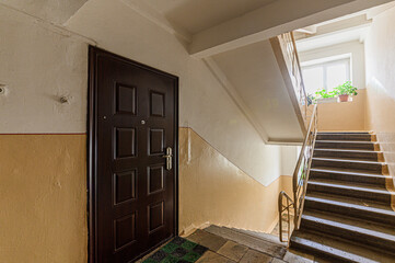 Russia, Moscow- April 10, 2020: interior public place, house entrance. doors, walls, staircase corridors
