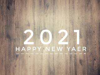 Happy new year 2021 with vintage wood texture defocused 