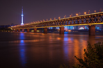 Fototapeta na wymiar The Wuhan Yangtze Great Bridge at night