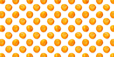 Autumn background made frem pumpkin. Background of orange miniature pumpkins. Thanksgiving or halloween background