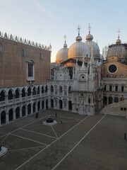 Old basilica in Venetian plaza. Venice architecture.