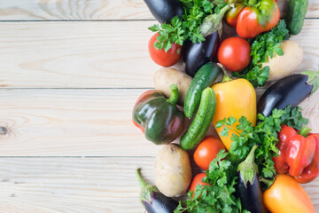 Fresh vegetables arranged in a group. Horizontal orientation, copyspace. Natural still life, healthy food