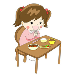 制服を着て机の前でいただきますをする女の子の園児