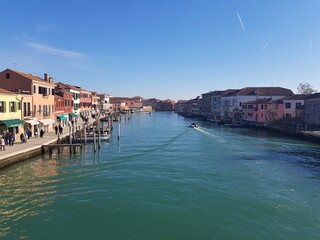 Fototapeta na wymiar View of Murano (Venice) from a bridge over the river. Murano (Venice) architecture.