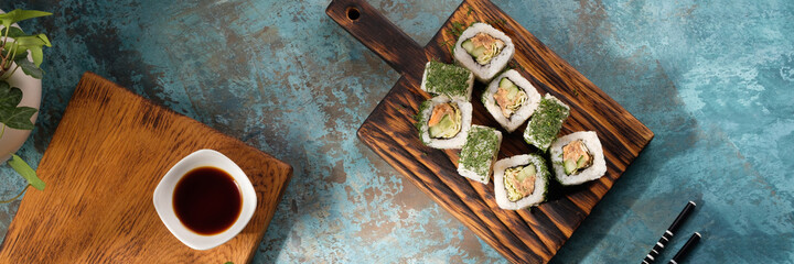 Unusual composition of rolls. A portion of rolls with an unusual filling. Top view of sushi.