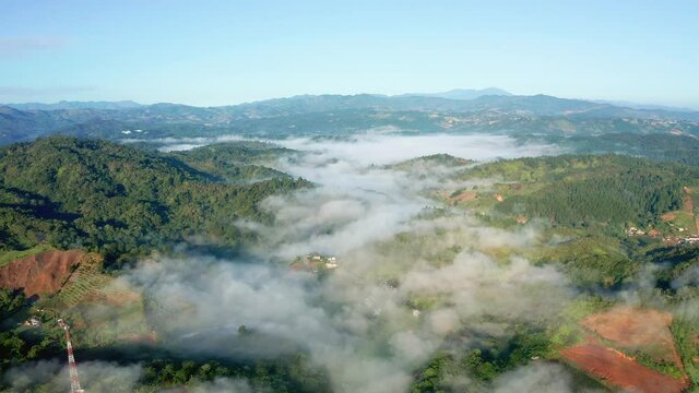 Forward flight above the clouds in the Constanza valley Dominican Republic