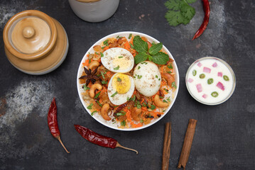 Egg biryani. Spicy Indian Malabar biryani or Hydrabadi biryani, Dum Biriyani,  fish and rice. pulao...