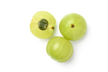 Flat lay (top view) of Fresh Indian gooseberry fruits with cut in half  isolated on white...