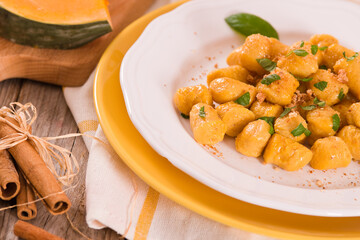 Pumpkin gnocchi with grated amaretti cookies.