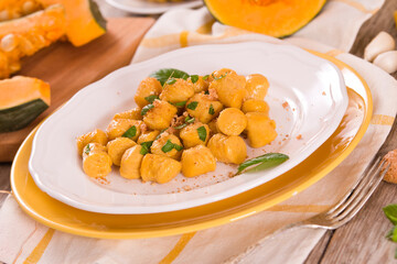 Pumpkin gnocchi with grated amaretti cookies.