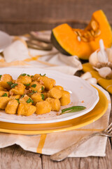 Pumpkin gnocchi with grated amaretti cookies.
