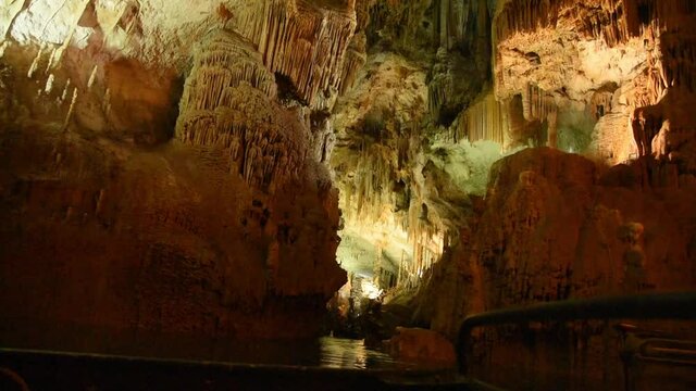 Cave, Underground river, Sail in a boat on an underground river, river in a cave, large cave with an underwater river, staloctites, stalogmites