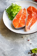 salmon fish raw red steak fillet seafood serving size copy space for text diet pescetarian food background rustic