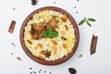 Chicken biryani. Spicy Indian Malabar biryani or Hydrabadi biryani, Dum Biriyani,  fish and rice....
