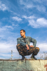 Naklejka premium Young handsome man model with urban style