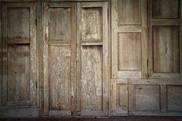 Old wooden brown house door in Chiang mai, Thailand