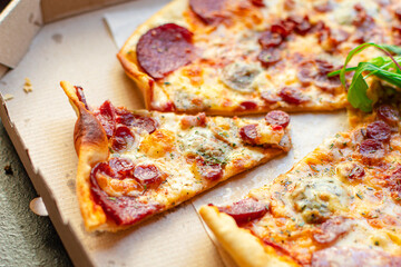 pizza meat salami sausage cheese tomato sauce
serving size fast food top view place copy space for text food background rustic 