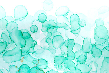 Alcohol ink green and gold abstract background. Bubble watercolor texture.