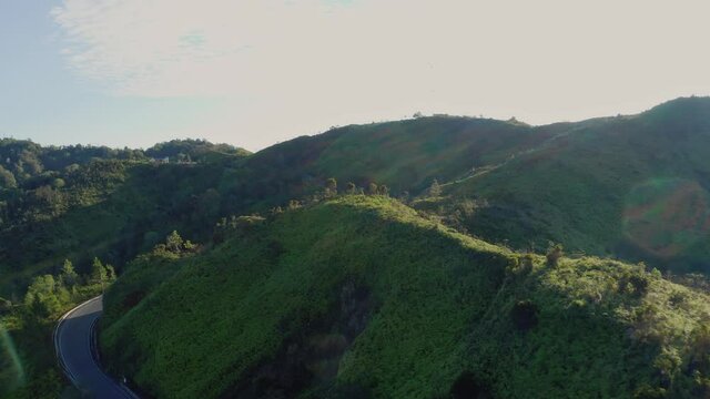 Low-altitude flight over a small mountain, in the town of Constanza, Dominican Republic