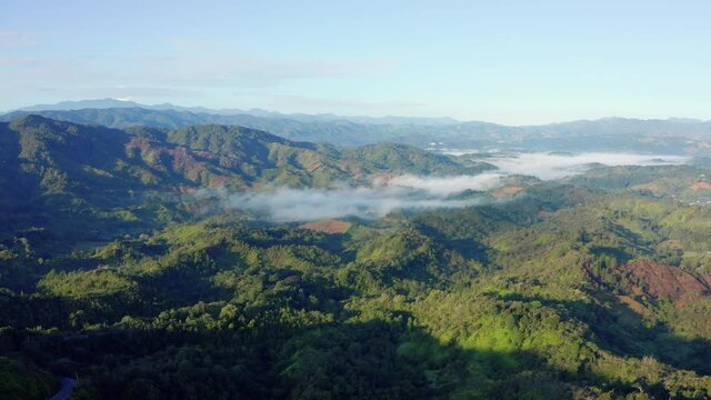 Beautiful view of the clouds over the town of constanza, Dominican Republic, starting the day