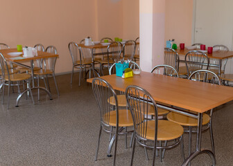 school kitchen canteen, metal table and chair legs, canteen equipment, tables and chairs